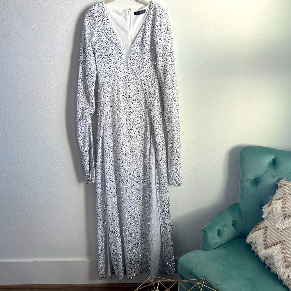 White and silver sequin dress with double leg slits and mesh detail at the chest